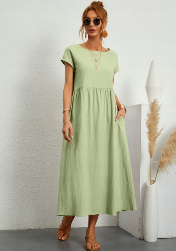 Robe trapèze manche courte vert pastel avec poches midi polyvalente